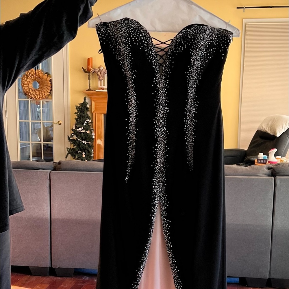 Beautiful black and pink with beading Prom dress. Worn once and was dry cleaned